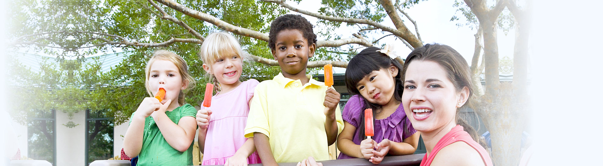 children eating popsicle